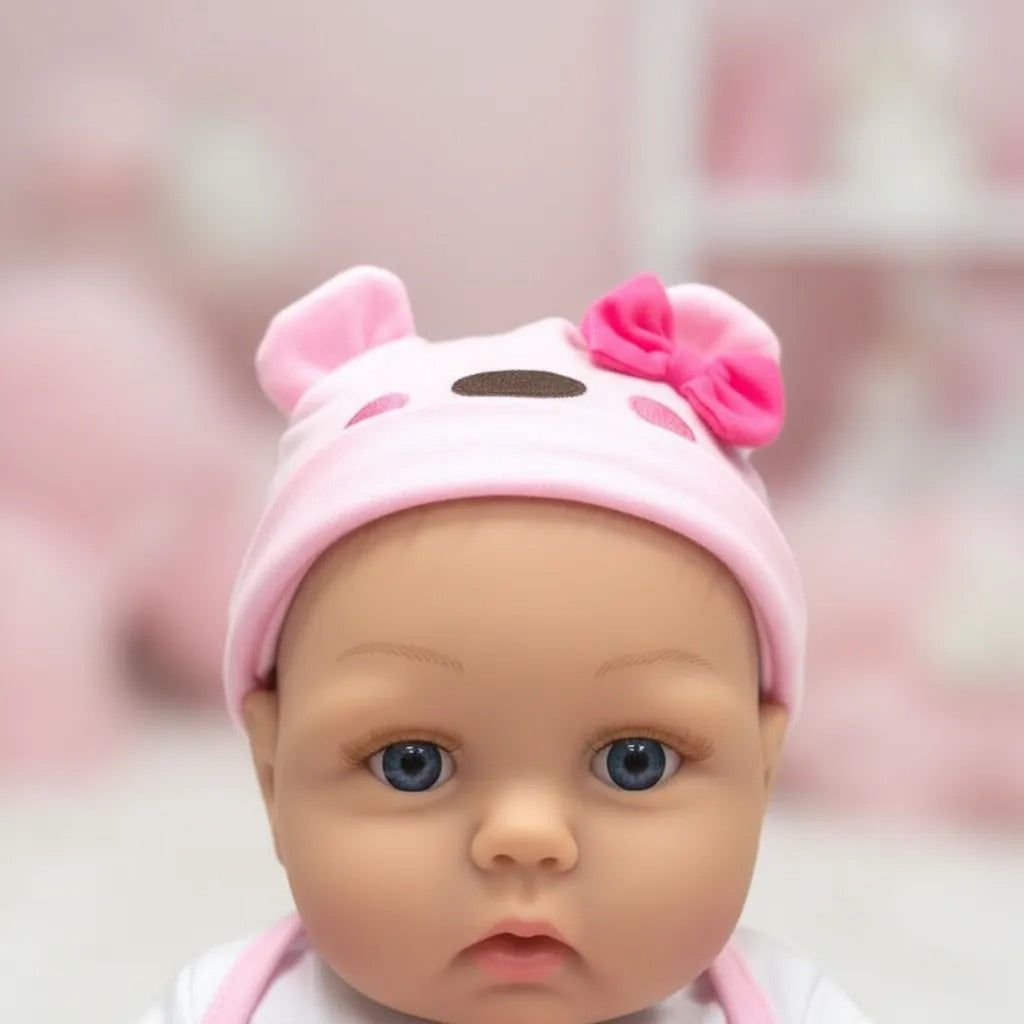 Bebé Reborn realista con ropita rosada - Mide 55cms y pesa 1200g